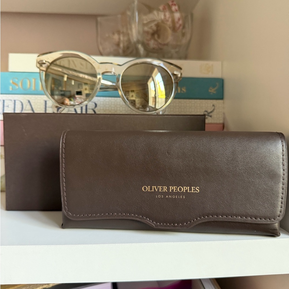 Oliver Peoples Clear Frame Sunglasses with Gold Lenses